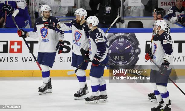 Damien Fleury, Guillaume Leclerc, Stephane Da Costa and Yohann Auvitu of France react during the 2018 IIHF Ice Hockey World Championship Group A...