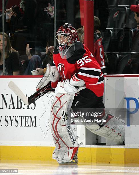 Yann Danis of the New Jersey Devils steps on the ice against the Tampa Bay Lightning during the continuation of the game from January 8, 2010 that...