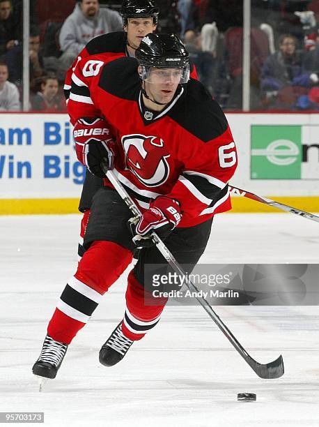 Andy Greene of the New Jersey Devils plays the puck against the Tampa Bay Lightning during the continuation of the game from January 8, 2010 that was...