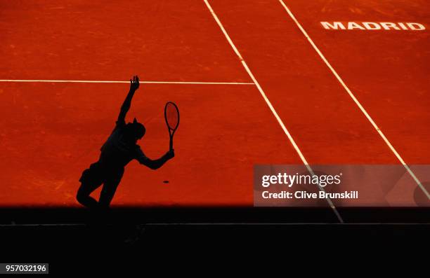 Denis Shapovalov of Canada serves against Milos Raonic of Canada in their third round match during day six of the Mutua Madrid Open tennis tournament...