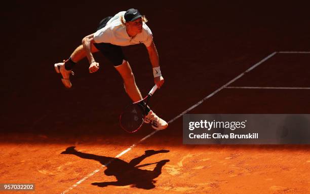 Denis Shapovalov of Canada serves against Milos Raonic of Canada in their third round match during day six of the Mutua Madrid Open tennis tournament...