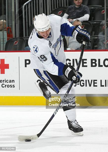 Blair Jones of the Tampa Bay Lightning fires a shot in warmups prior to the start of the continuation of the game against the New Jersey Devils from...