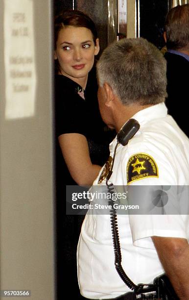 Actress Winona Ryder arrives at the Beverly Hills Superior Court for her trial on charges of alleged grand theft, commercial burglary and vandalism...