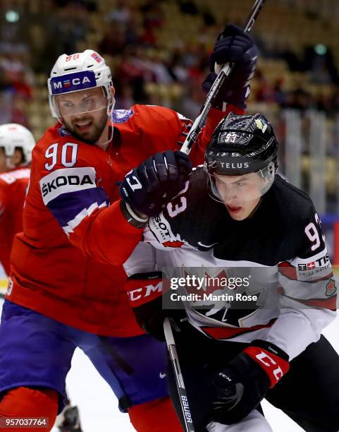 Daniel Sorvik of Norway and Ryan Nugent Hopkins of Canada battle for the puck during the 2018 IIHF Ice Hockey World Championship Group B game between...