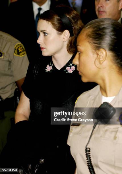 Actress Winona Ryder arrives for the afternoon session at the Beverly Hills Superior Court for her trial on charges of alleged grand theft,...