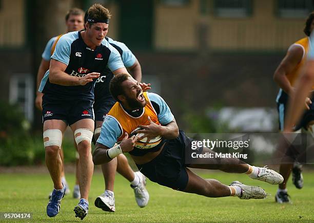 Nemani Nadolo dives for the ball during a Waratahs Super 14 training session at Victoria Barracks on January 12, 2010 in Sydney, Australia.