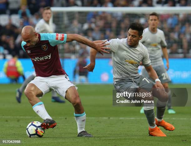 Alexis Sanchez of Manchester United in action with Pablo Zabaleta of West Ham United during the Premier League match between West Ham United and...