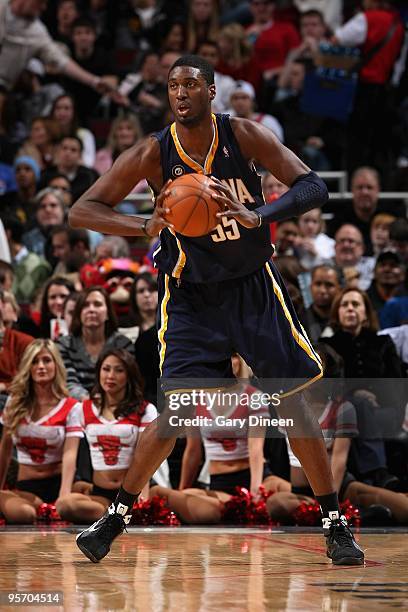 Roy Hibbert of the Indiana Pacers looks to pass the ball against the Chicago Bulls during the game on December 29, 2009 at the United Center in...