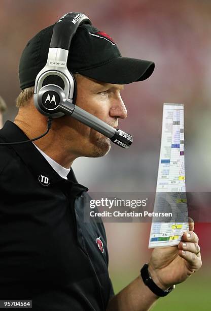 Head coach Ken Whisenhunt of the Arizona Cardinals watches from the sidelines during the 2010 NFC wild-card playoff game against the Green Bay...