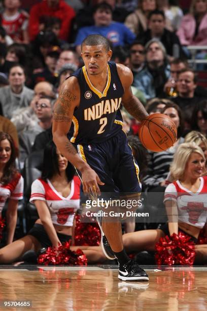 Earl Watson of the Indiana Pacers brings the ball upcourt against the Chicago Bulls during the game on December 29, 2009 at the United Center in...