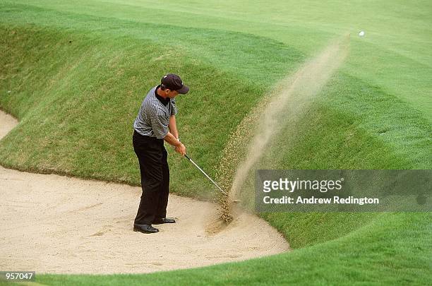 David Higgins of Ireland plays out of a bunker during the Scottish PGA Championship at the Gleneagles Hotel in Scotland. \ Mandatory Credit: Andrew...
