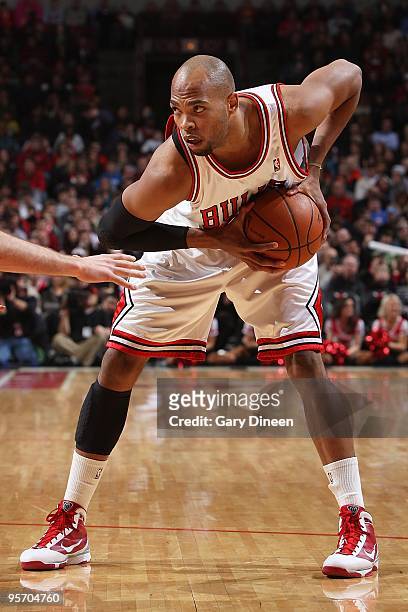 Taj Gibson of the Chicago Bulls handles the ball against the Indiana Pacers during the game on December 29, 2009 at the United Center in Chicago,...