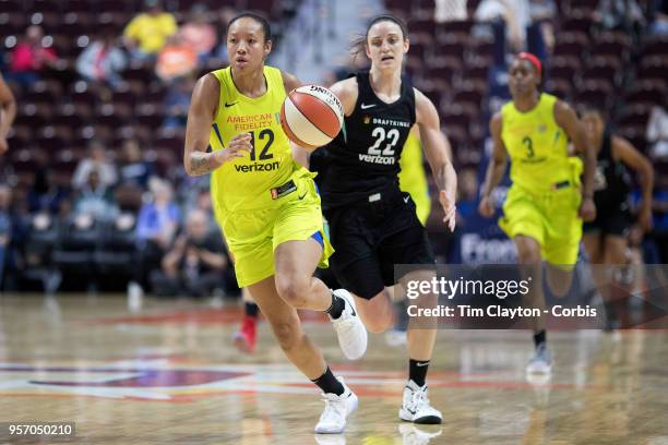 May 7: Saniya Chong of the Dallas Wings defended by Kelly Faris of the New York Liberty during the Dallas Wings Vs New York Liberty, WNBA pre season...