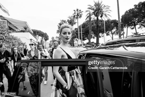 Amber Heard departs the Martinez Hotel during the 71st annual Cannes Film Festival at on May 10, 2018 in Cannes, France.