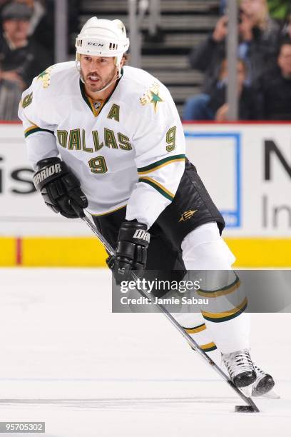 Forward Mike Modano of the Dallas Stars skates with the puck against the Columbus Blue Jackets on January 10, 2010 at Nationwide Arena in Columbus,...