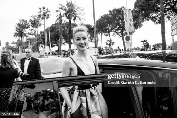 Amber Heard departs the Martinez Hotel during the 71st annual Cannes Film Festival at on May 10, 2018 in Cannes, France.