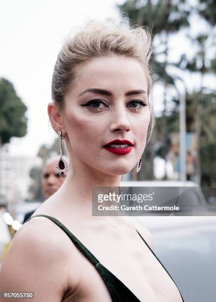 Amber Heard departs the Martinez Hotel during the 71st annual Cannes Film Festival at on May 10, 2018 in Cannes, France.