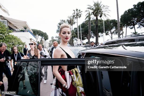 Amber Heard departs the Martinez Hotel during the 71st annual Cannes Film Festival at on May 10, 2018 in Cannes, France.