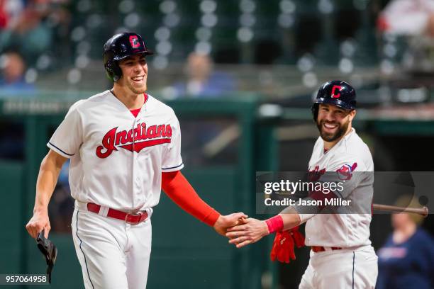 Bradley Zimmer of the Cleveland Indians celebrates with Jason Kipnis after Zimmer scores during the sixth inning against the Toronto Blue Jays in...