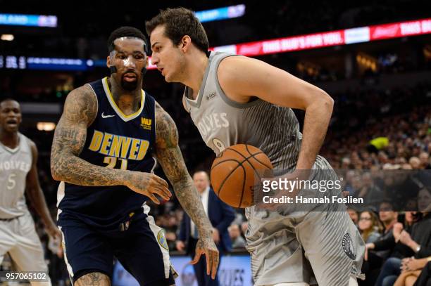 Wilson Chandler of the Denver Nuggets defends against Nemanja Bjelica of the Minnesota Timberwolves during the game on April 11, 2018 at the Target...