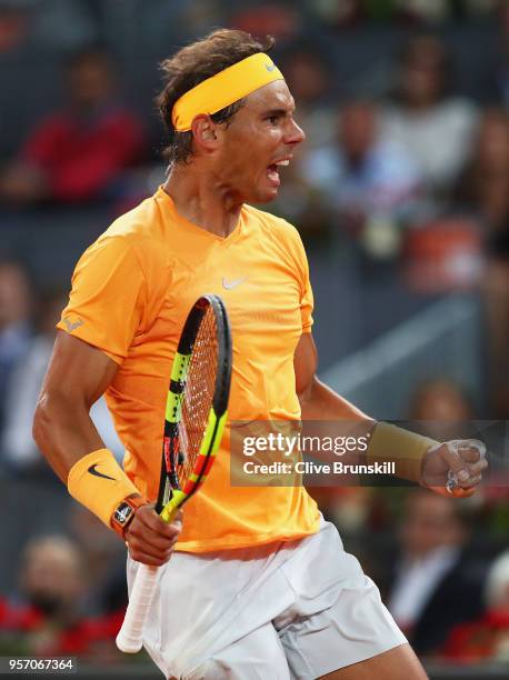 Rafael Nadal of Spain celebrates match point against Diego Schwartzman of Argentina in their third round match during day six of the Mutua Madrid...