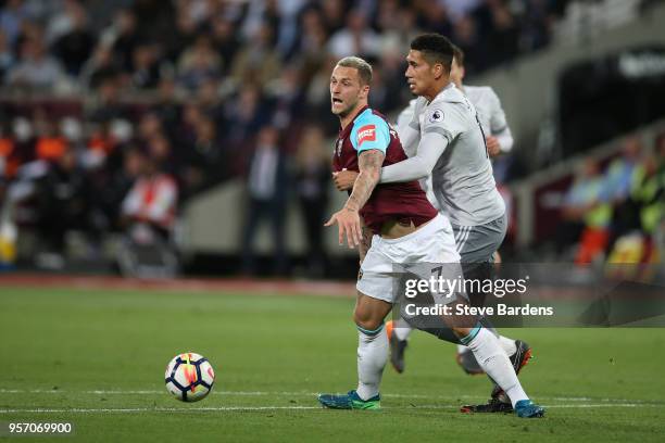 Marko Arnautovic of West Ham United and Chris Smalling of Manchester United in action during the Premier League match between West Ham United and...