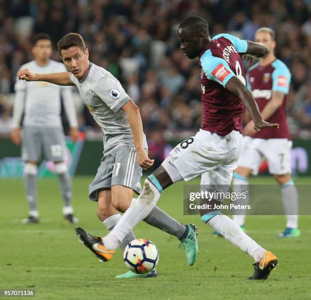 Ander Herrera of Manchester United in action with Cheikhou Kouyate of West Ham United during the Premier League match between West Ham United and...