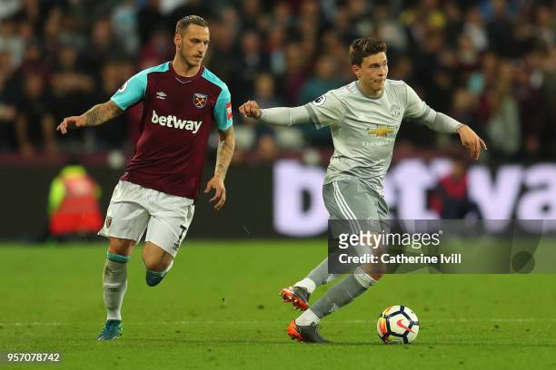 Marko Arnautovic of West Ham United and Victor Lindelof of Manchester United in action during the Premier League match between West Ham United and...