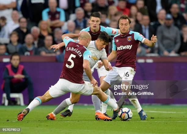 Pablo Zabaleta of West Ham United in action with Alexis Sanchez of Manchester United during the Premier League match between West Ham United and...