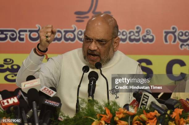 Bharatiya Janata Party national president Amit Shah speaks to media during a BJP press conference on the last day of campaigning of the Karnataka...