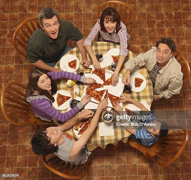 Walt Disney Television via Getty Images's "The Middle" stars Eden Shur as Sue, Neil Flynn as Mike, Patricia Heaton as Frankie, Chris Kattan as Bob,...