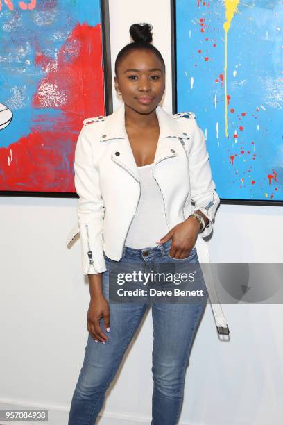 Tinea Taylor attends Once Upon A Time by contemporary Irish street artist Robyn Ward on May 10, 2018 in London, England.