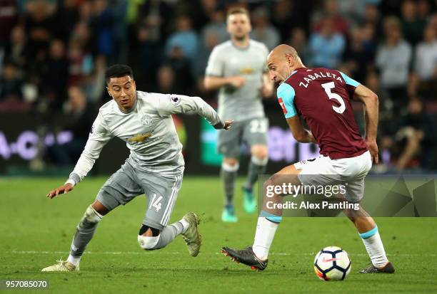 Jesse Lingard of Manchester United goes past Pablo Zabaleta of West Ham United during the Premier League match between West Ham United and Manchester...