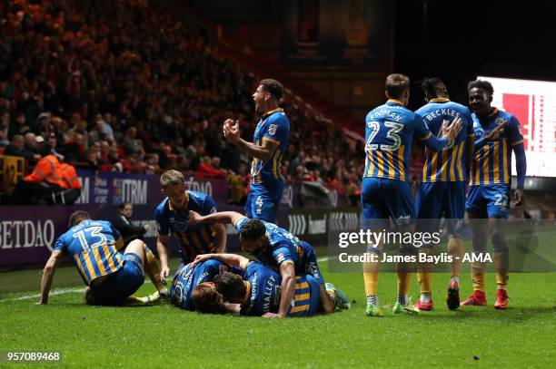 Jon Nolan of Shrewsbury Town celebrates with his team mates after scoring a goal to make it 0-1 during the Sky Bet League One Play Off Semi...