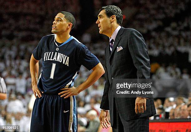 Scottie Reynolds and Jay Wright the Head Coach of the Villanova Wildcats are pictured during the 92-84 win over the Louisville Cardinals during the...