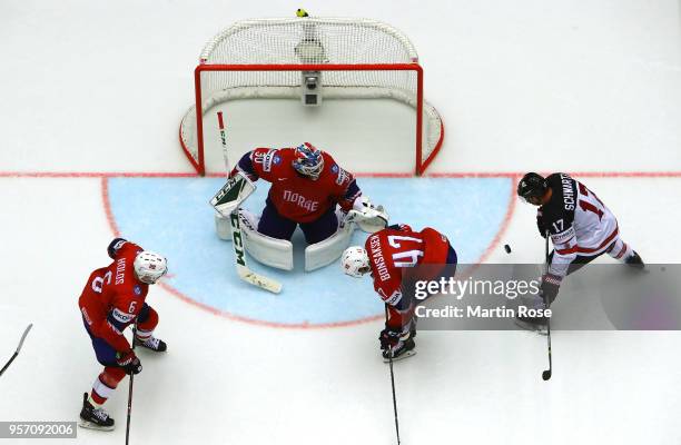 Lars Haugen, goaltender of Norway tends net against Jaden Schwartz of Canada during the 2018 IIHF Ice Hockey World Championship Group B game between...