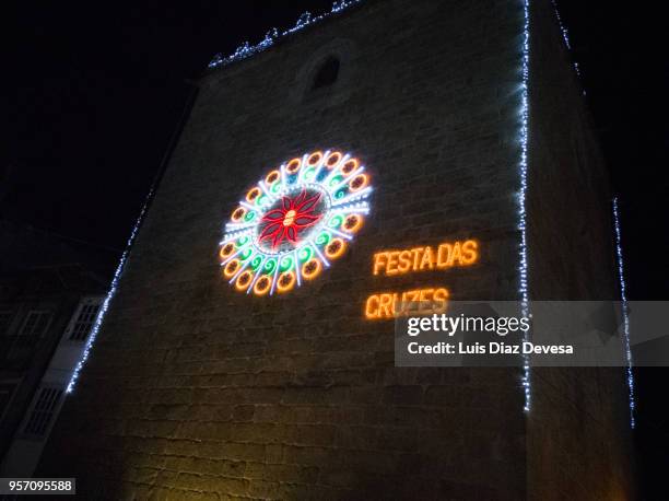 string lights during night ofthe feast of crosses (barcelos - portugal) - braga district stock-fotos und bilder