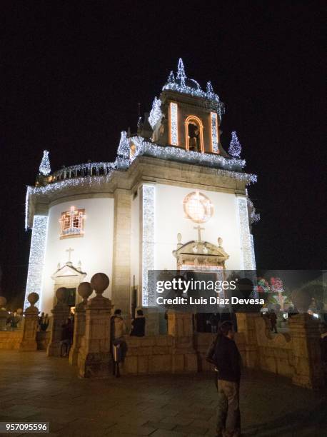 string lights during night ofthe feast of crosses (barcelos - portugal) - braga district stock-fotos und bilder