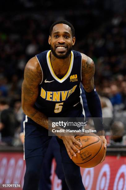 Will Barton of the Denver Nuggets handles the ball against the Minnesota Timberwolves during the game on April 11, 2018 at the Target Center in...