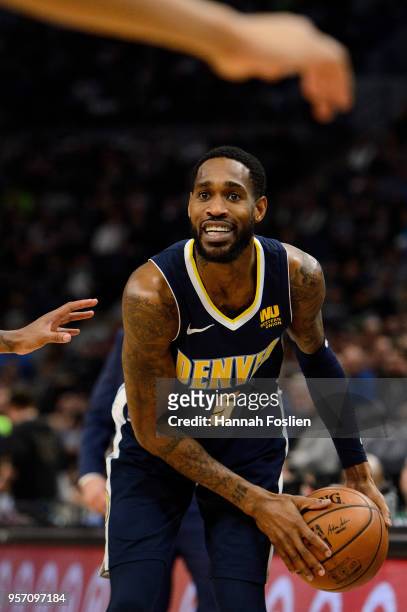 Will Barton of the Denver Nuggets handles the ball against the Minnesota Timberwolves during the game on April 11, 2018 at the Target Center in...