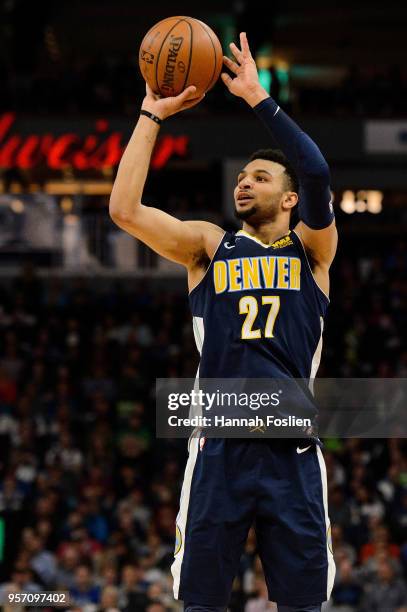 Jamal Murray of the Denver Nuggets shoots the ball against the Minnesota Timberwolves during the game on April 11, 2018 at the Target Center in...