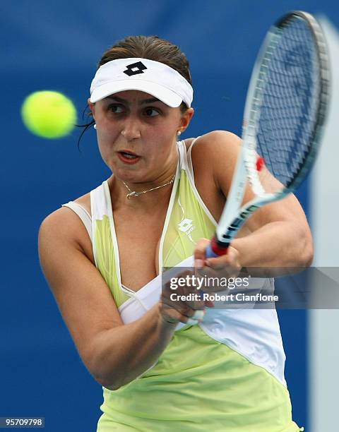 Tamira Paszek of Austria plays a backhand in her second round singles match against Gisela Dulko of Argentina during day five of the Moorilla Hobary...