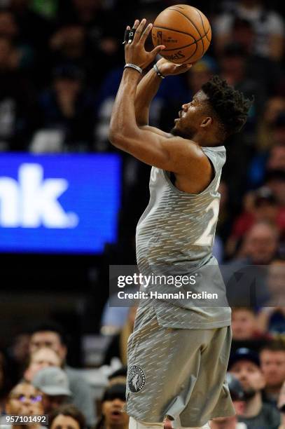 Jimmy Butler of the Minnesota Timberwolves shoots the ball against the Denver Nuggets during the game on April 11, 2018 at the Target Center in...