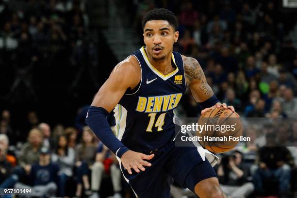 Gary Harris of the Denver Nuggets drives to the basket against the Minnesota Timberwolves during the game on April 11, 2018 at the Target Center in...