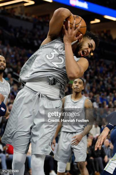 Karl-Anthony Towns of the Minnesota Timberwolves rebounds the ball against the Denver Nuggets during the game on April 11, 2018 at the Target Center...