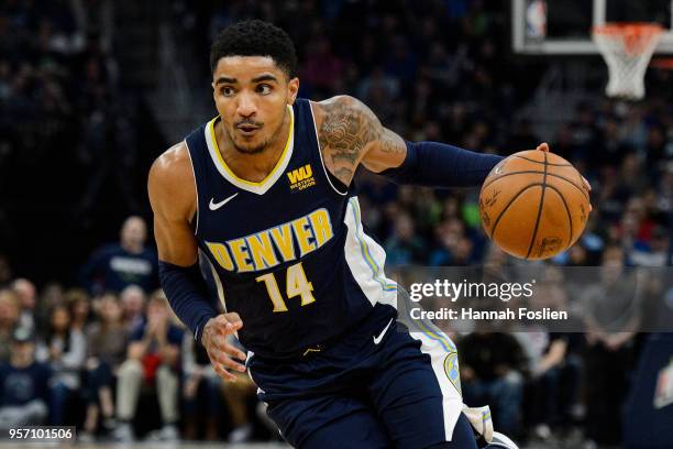 Gary Harris of the Denver Nuggets drives to the basket against the Minnesota Timberwolves during the game on April 11, 2018 at the Target Center in...