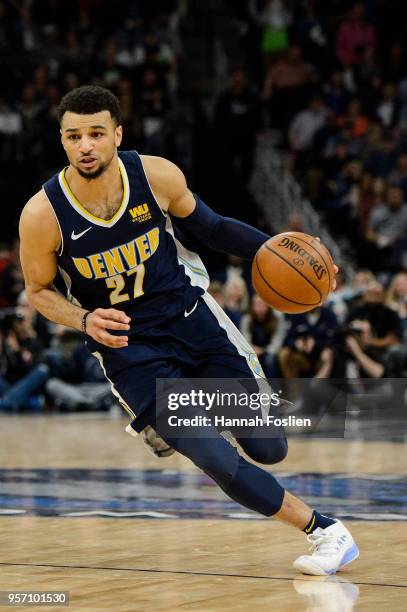 Jamal Murray of the Denver Nuggets drives to the basket against the Minnesota Timberwolves during the game on April 11, 2018 at the Target Center in...