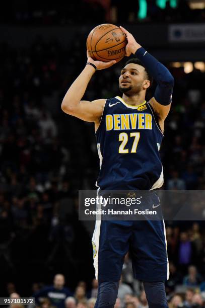 Jamal Murray of the Denver Nuggets shoots the ball against the Minnesota Timberwolves during the game on April 11, 2018 at the Target Center in...