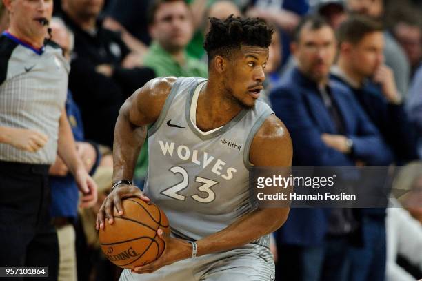 Jimmy Butler of the Minnesota Timberwolves handles the ball against the Denver Nuggets during the game on April 11, 2018 at the Target Center in...