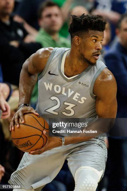 Jimmy Butler of the Minnesota Timberwolves handles the ball against the Denver Nuggets during the game on April 11, 2018 at the Target Center in...